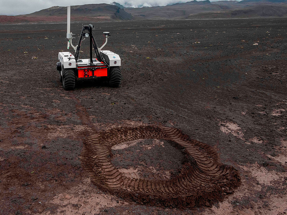 In this picture taken on 19 July 2019 shows the NASA`s new robotic space explorer at their base at the Lambahraun lava field in Iceland where they are getting it ready for the next mission to Mars. Photo: AFP