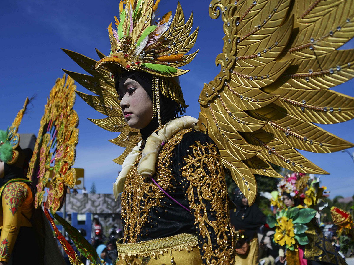 Indonesian students participate in a carnival to celebrate the country`s 74th Independence Day, in Banda Aceh on 18 August 2019. Photo: AFP