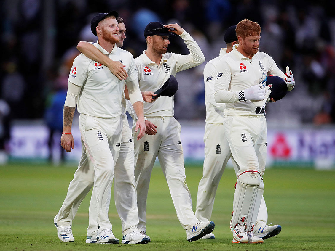 England players leave the field after the second Test ends in a draw against Australia in Lord`s Cricket Ground, London, Britain on 18 August, 2019. Photo: Reuters