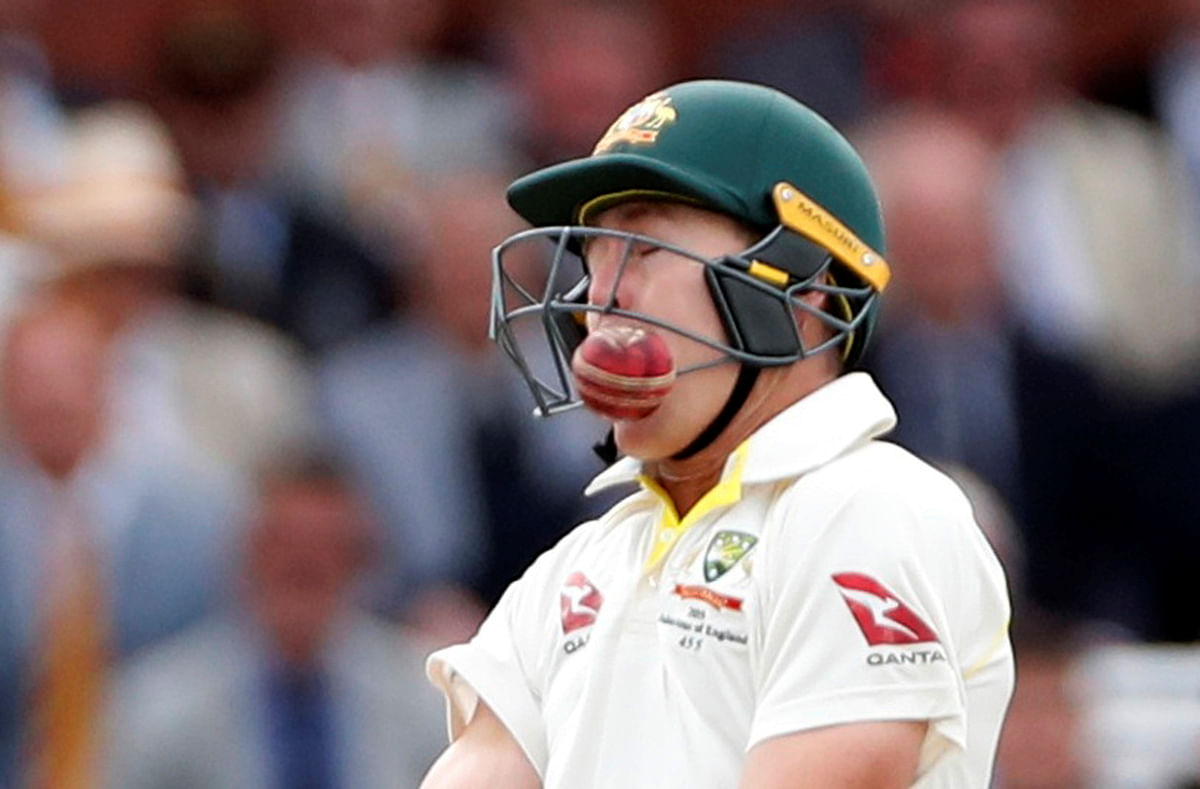 Australia`s Marnus Labuschagne is hit by a ball from England`s Jofra Archer in second Ashes Test in Lord`s Cricket Ground, London, Britain on 18 August, 2019. Photo: Reuters