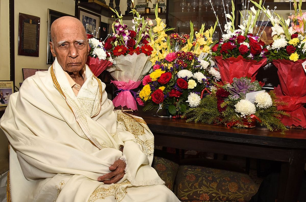 In this file photo taken on 18 February, 2019 Bollywood music director and background score composer Mohammed Zahur Khayyam, better known as Khayyam, poses for photographs during his 92nd birthday celebration at his home in Mumbai. Photo: AFP