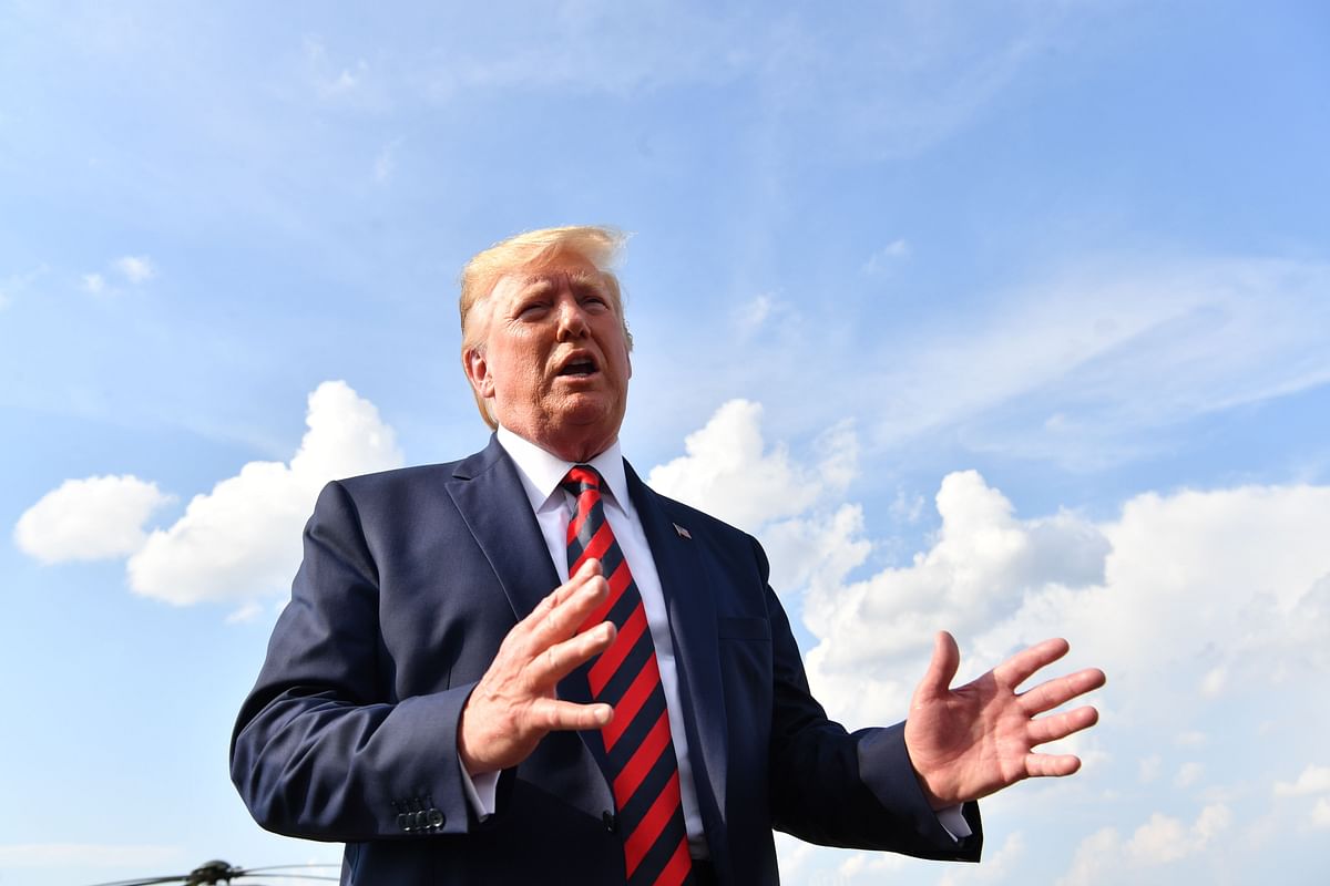 US president Donald Trump speaks to the press before boarding Air Force One in Morristown, New Jersey, on 18 August 2019. Photo: AFP