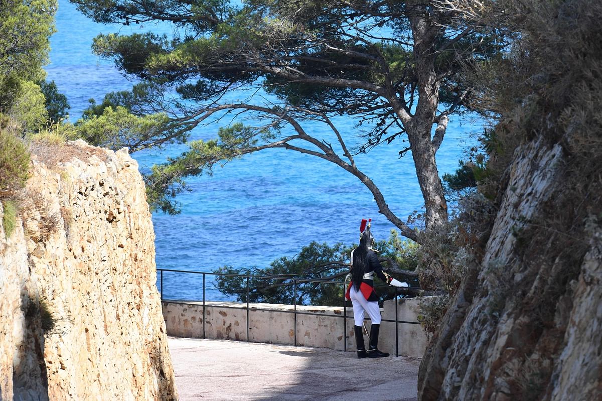 A Republican guard looks at the sea at the French President` summer retreat of the fort of Bregancon near the village of Bormes-les-Mimosas on France`s Mediterranean coast on 19 August 2019. Photo: AFP