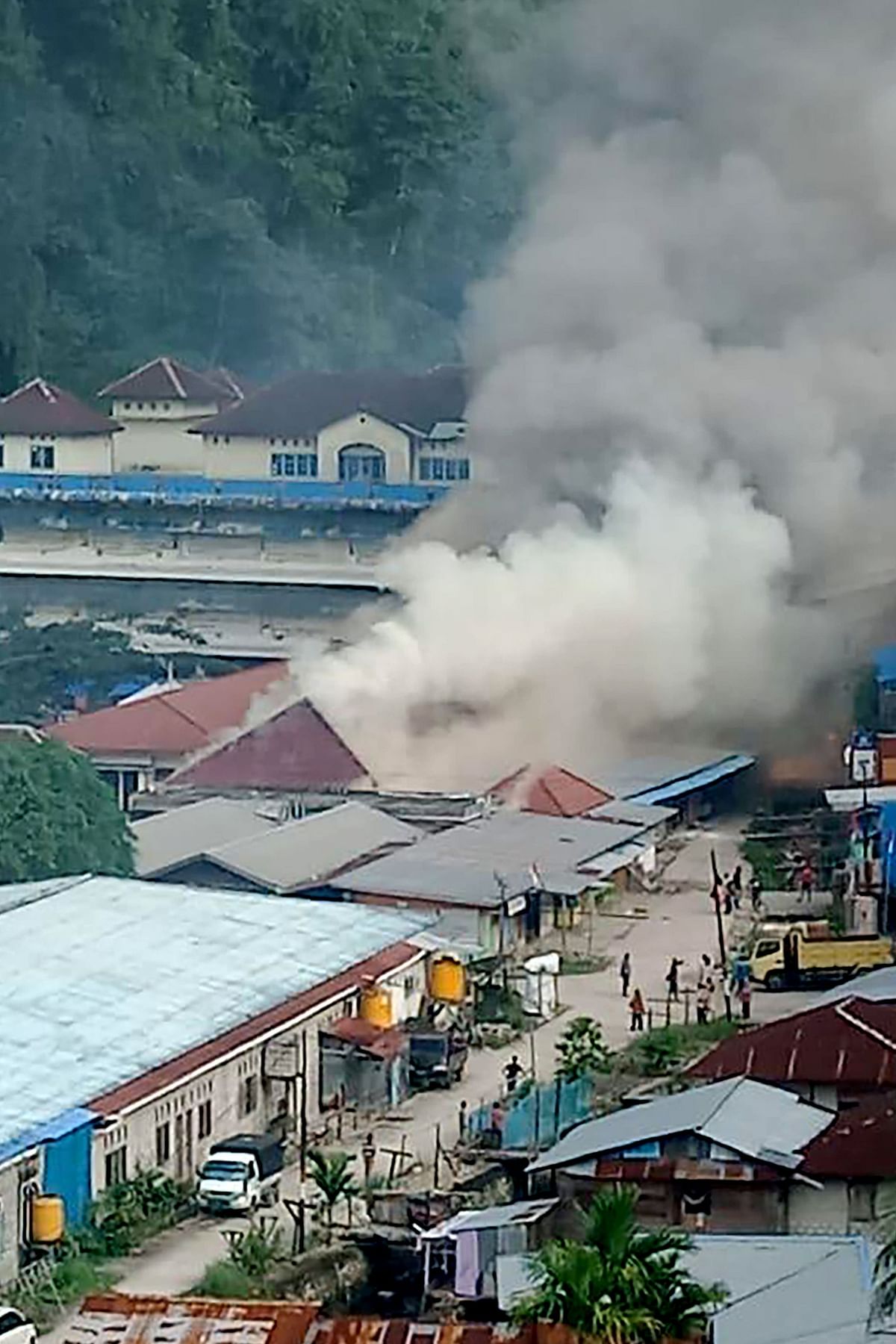 A building burns as protesters take to the streets in the city of Fakfak, Papua province, Indonesia on 21 August 2019. Photo: AFP