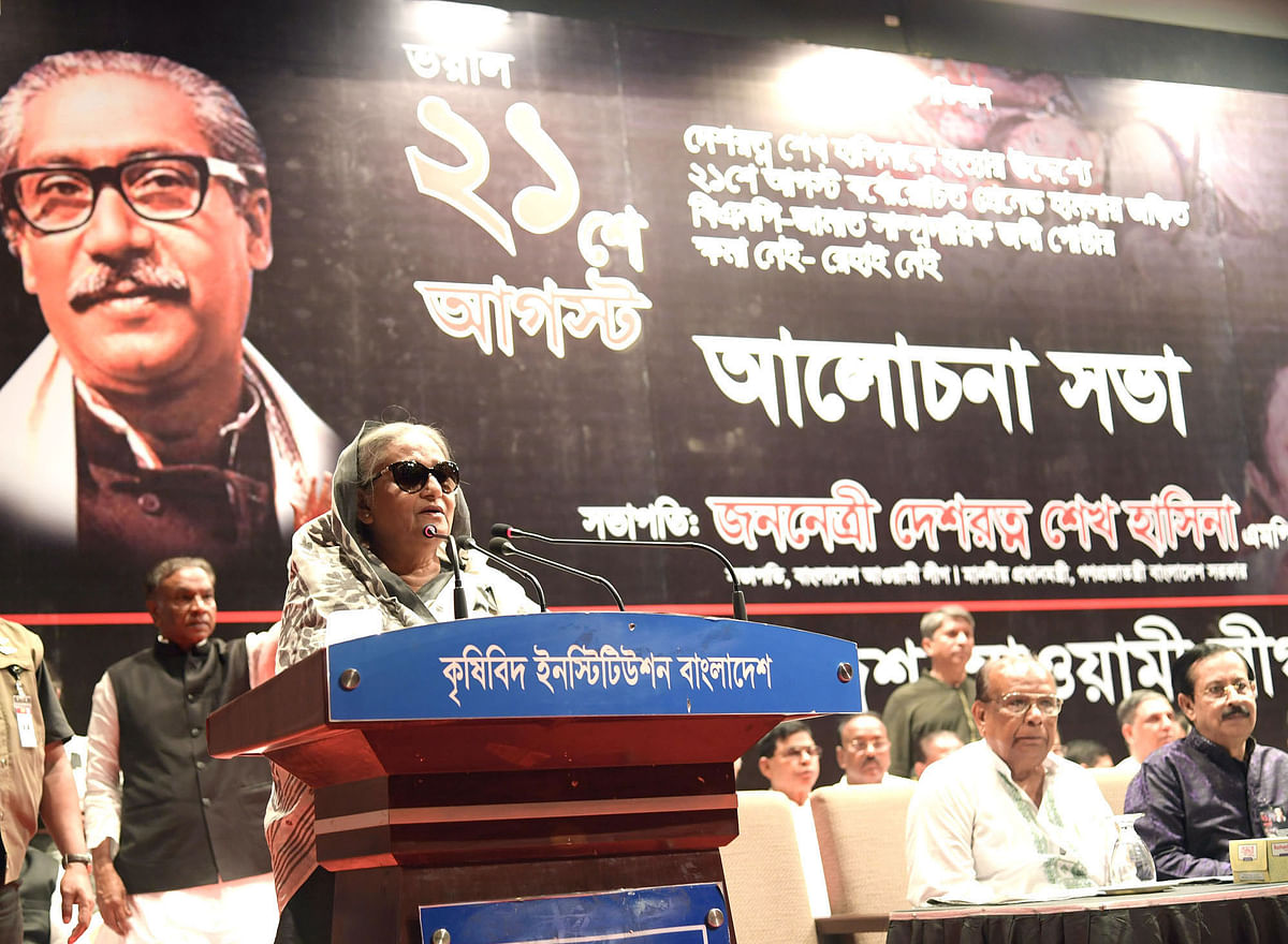 Prime minister Sheikh Hasina addresses a discussion marking the 15th anniversary of the 21 August grenade attack at Krishibid Institute of Bangladesh, Dhaka on Wednesday. Photo: PID