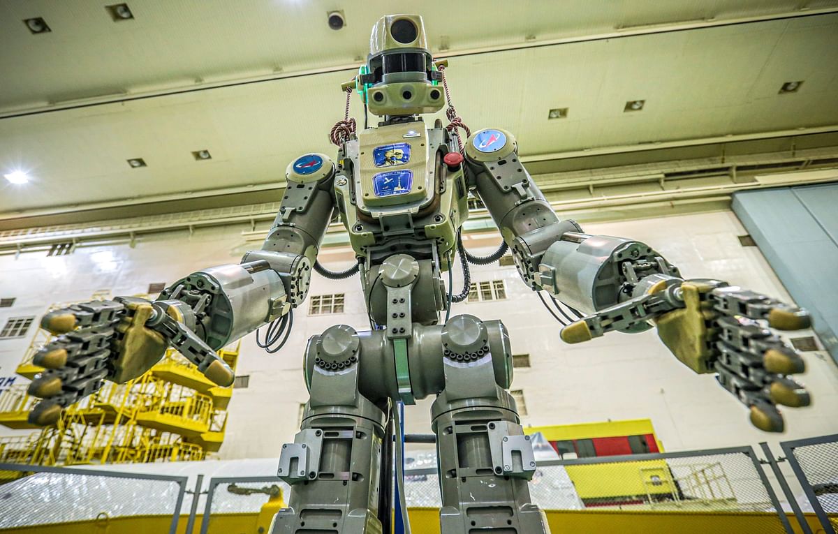 This handout picture taken on 26 July 2019 and released by the official website of the Russian State Space Corporation ROSCOSMOS on 21 August 2019 shows Russian humanoid robot Skybot F-850 (Fedor) being tested ahead of its flight on board Soyuz MS-14 spacecraft at the Baikonur Cosmodrome in Kazakhstan. Photo: AFP