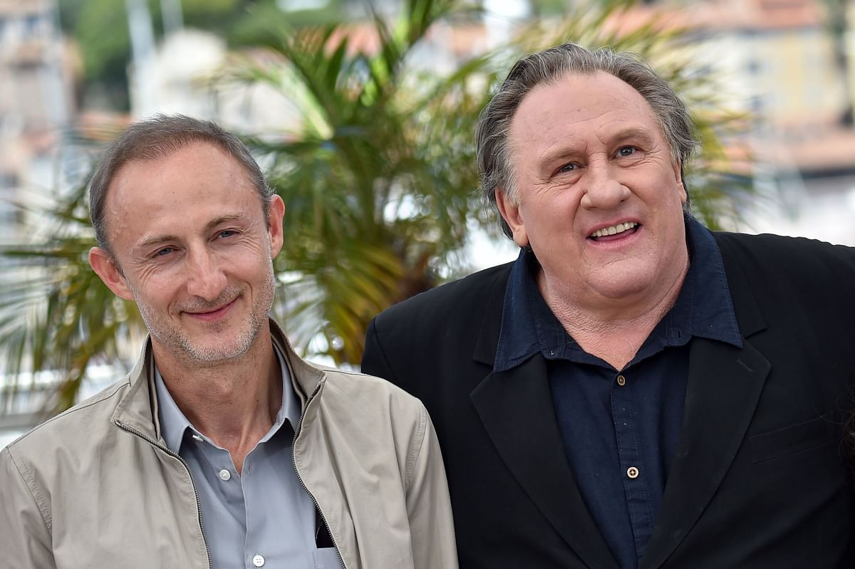 This file photo taken on 22 May 2015 shows French director Guillaume Nicloux (L) and French actor Gerard Depardieu posing during a photocall for the film `Valley of Love` at the 68th Cannes Film Festival in Cannes, southeastern France. Photo: AFP