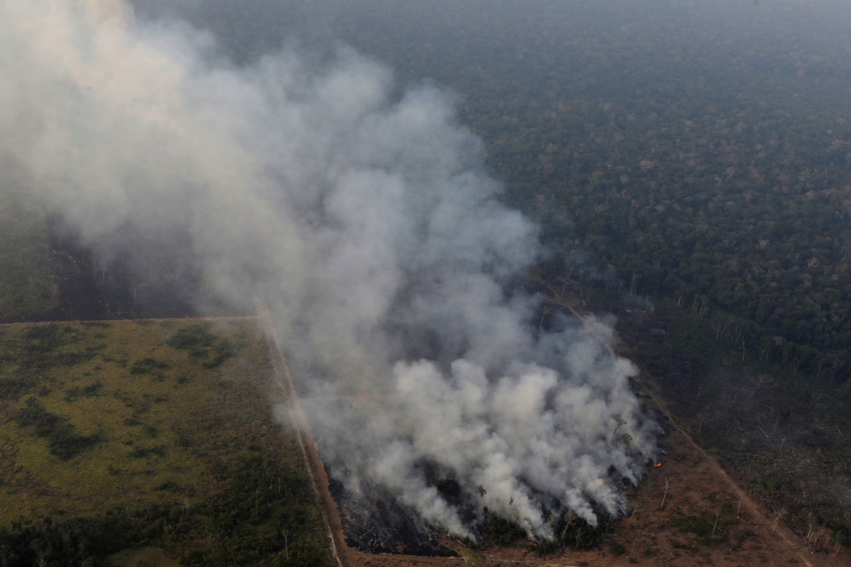 Smoke billows during a fire in an area of the Amazon rainforest near Porto Velho, Rondonia. Photo: Reuters