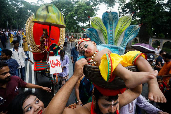 Members of the Hindu community brought out processions in Palashi area of the capital. Photo: Dipu Malakar