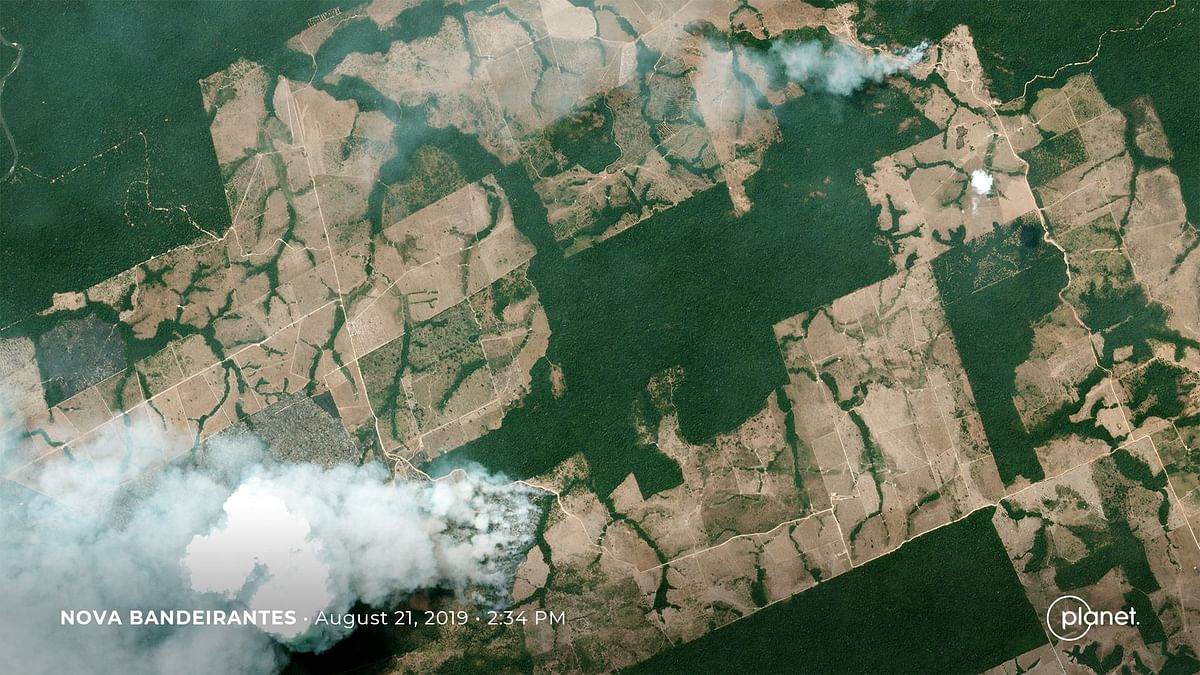 This handout picture collected by a satellite of 2019 Planet Labs, Inc on 21 August 2019 shows smoke and fires in Brazil`s state Nova Bandeirantes. Photo: AFP