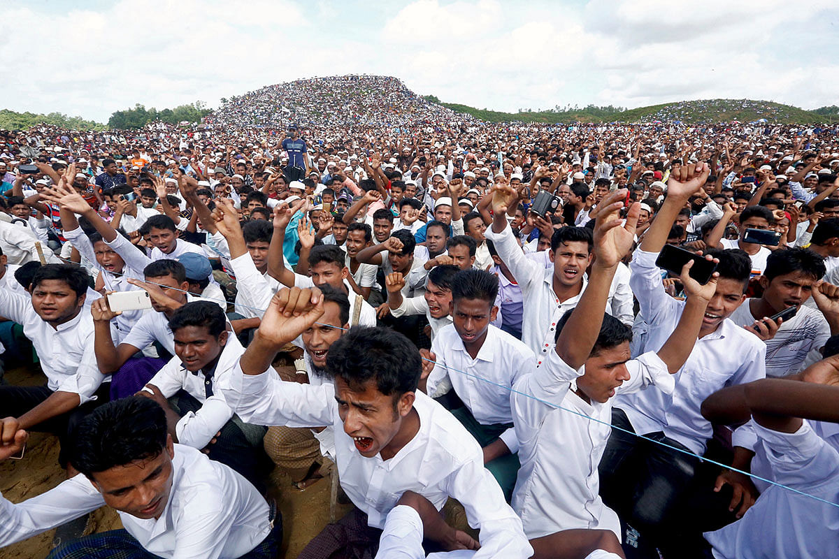 Rohingya refugees shout slogans as they gather to mark the second anniversary of the exodus at the Kutupalong camp in Cox’s Bazar, Bangladesh, 25 August 2019. Photo: Reuters