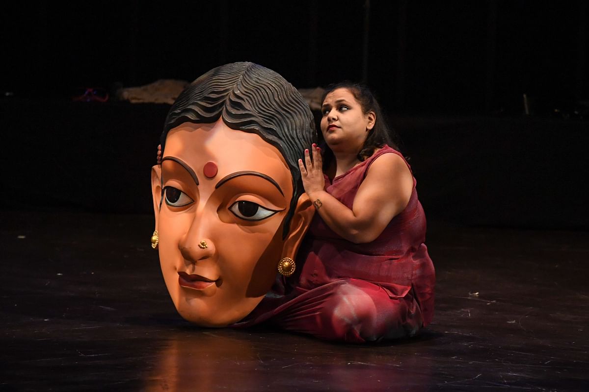In this photo taken on 24 August 2019, performers take part in a production of the show `Head 2 Head` in a theatre at the Indian Habitat Centre in New Delhi. Head 2 Head, a retelling of Girish Karnad’s Hayavadana, is produced by the Bangalore-based The Big Fat Company -- a theatre group that aims to only cast plus-size actors in its productions. Photo: AFP