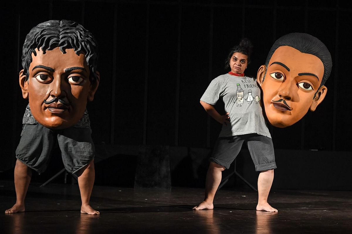 In this photo taken on 24 August 2019, performers take part in a rehearsal for the show `Head 2 Head` in a theatre at the Indian Habitat Centre in New Delhi. Photo: AFP