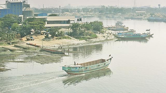 Industries have been set up encroaching the river banks. the picture taken from the banks of Balu river near the Sultana Kamal Bridge in Demra area. Photo: Prothom Alo