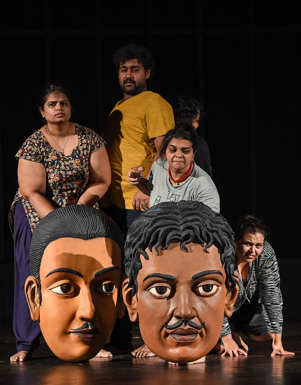In this photo taken on 24 August 2019, performers take part in a rehearsal for the show `Head 2 Head` in a theatre at the Indian Habitat Centre in New Delhi. Photo: AFP