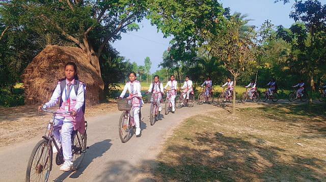 Students go to school riding bi-cycles. Prothom Alo File Photo