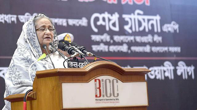 Prime minister Sheikh Hasina speaks at a discussion on the occasion of the National Mourning Day at Bangabandhu International Conference Centre on Friday. Photo :PIB