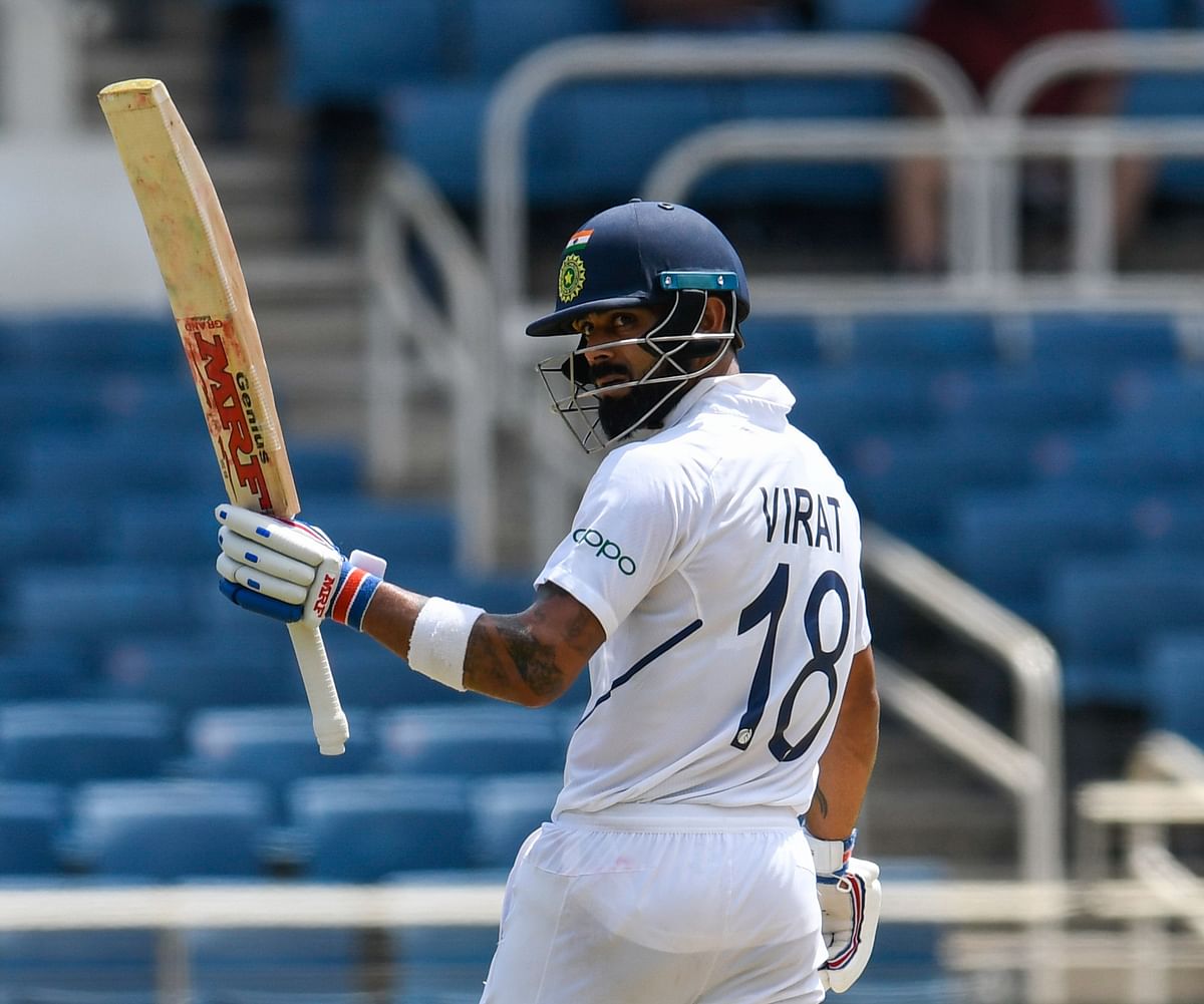 Virat Kohli of India celebrates his half century during day 1 of the 2nd Test between West Indies and India at Sabina Park, Kingston, Jamaica, on 30 August 2019. Photo: AFP
