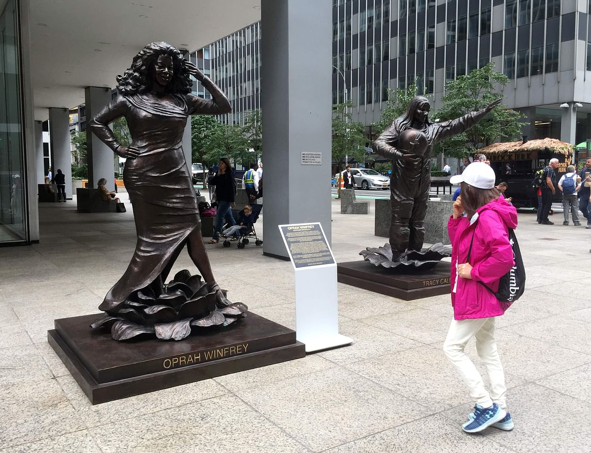 Statues of television producer Oprah Winfrey (L) and astronaut Tracy Caldwell Dyson by Australian artists, Marc and Gillie Schattner, are exhibited on 27 August 2019, in New York. Photo: AFP