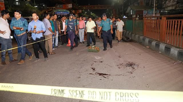 Dhaka Metropolitan Police commissioner Asaduzzaman Mia visits the spot of bomb attack in Science Lab intersection area, Dhaka on Saturday night. Photo: Tanvir Ahmed