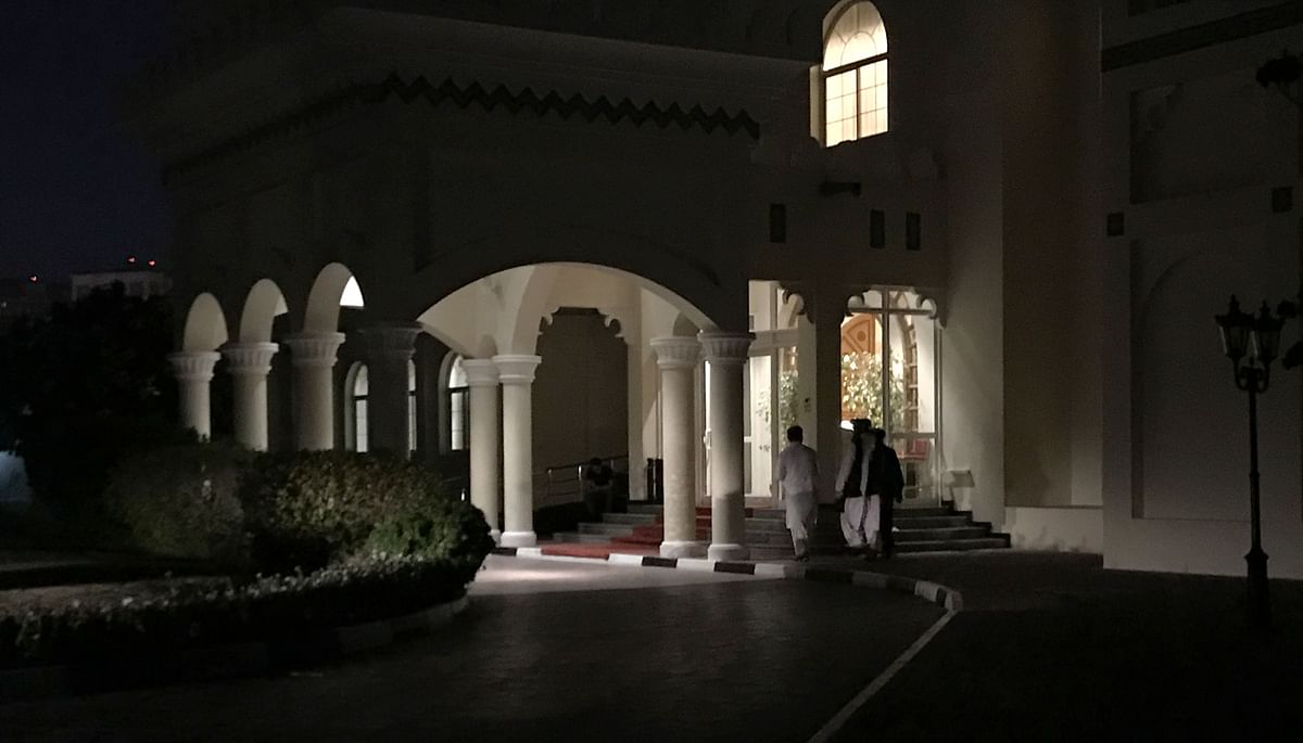 Members of Taliban negotiating team enter the venue housing the talks between US and Taliban negotiators in the Qatari capital Doha, on Thursday. Photo: AFP