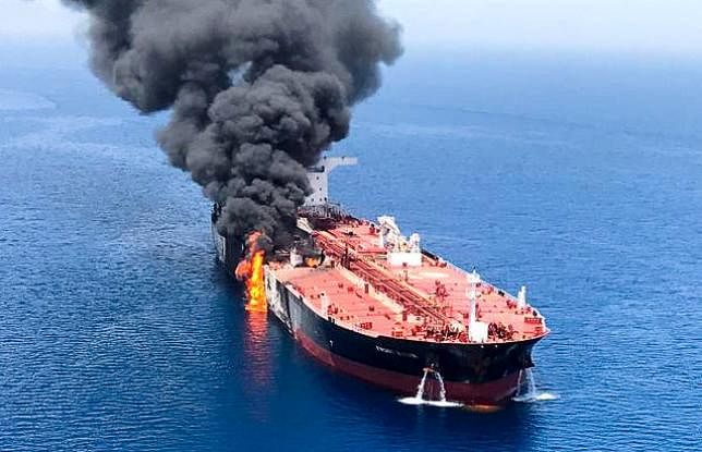 An oil tanker is seen after it was attacked at the Gulf of Oman, in waters between Gulf Arab states and Iran on 13 June. Photo: Reuters