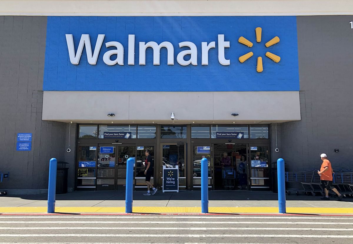 Customers enter a Walmart store on 3 September 2019 in San Leandro, California. Walmart, America`s largest retailer, announced that it will reduce the sales of gun ammunition that can be used in handguns and assault style rifles, including .223 caliber and 5.56 caliber bullets. Photo: AFP
