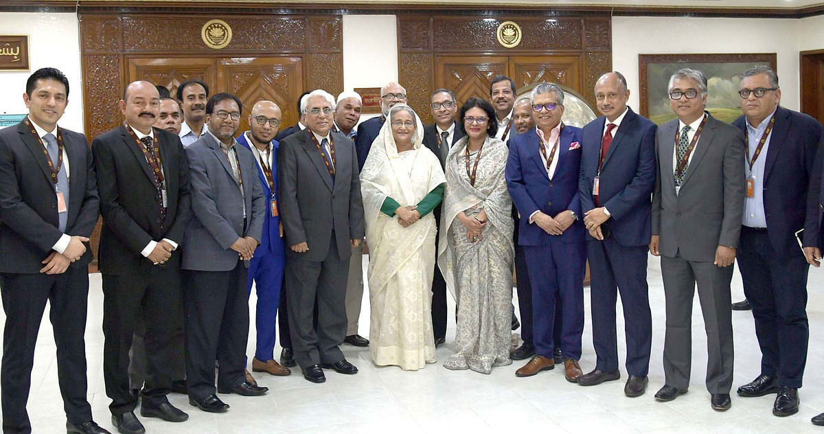The newly elected members of BGMEA’s board of directors meet prime minister Sheikh Hasina at her office on Wednesday. Photo: PID