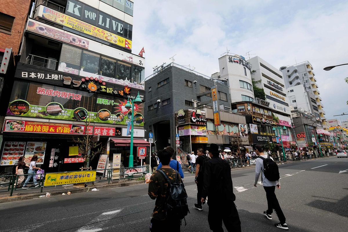 This picture taken on 26 August 2019 shows a general view of the Shin-Okubo district, known as Tokyo`s Korean town lined with small shops, most of them selling Korean food and pop-culture items. Photo: AFP