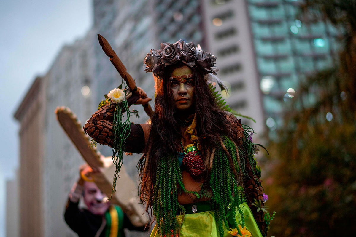 Activists take part in a demonstration against Brazilian President Jair Bolsonaro`s environmental policies and the destruction of the Amazon rainforest in Rio de Janeiro, Brazil, on 5 September, 2019. Photo: AFP