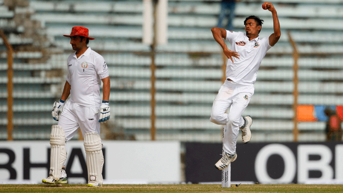 Bangladeshi cricketer Taijul Islam (R) delivers a ball during the first day of the one-off cricket Test match between Bangladesh and Afghanistan at the Zohur Ahmed Chowdhury Stadium in Chittagong on 5 September 2019. Photo: AFP