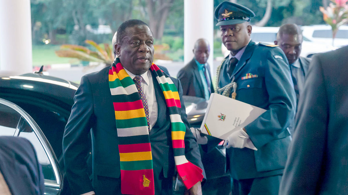 Zimbabwean president Emmerson Mnangagwa arrives at State House in Harare on Friday, prior to make a statement following the death of former president Robert Mugabe. Zimbabwe`s president declared Robert Mugabe a `national hero` on Friday, adding that the country would mourn the former leader until his burial. Photo: AFP