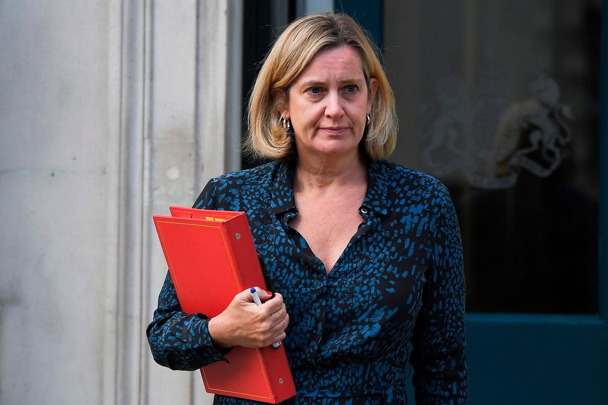 Britain`s Work and Pensions Secretary and Women`s minister Amber Rudd leaves the Cabinet Office on Whitehall in London. Senior minister Amber Rudd quit her work and pensions post in protest at his handling of the Brexit crisis on Saturday. AFP file photo