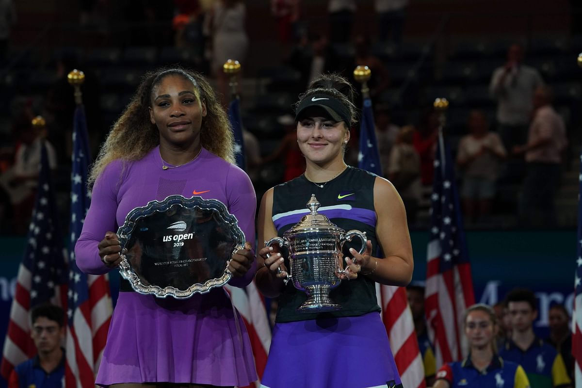 Bianca Andreescu of Canada (R) poses with the trophy after she won against Serena Williams of the US after the Women`s Singles Finals match at the 2019 US Open at the USTA Billie Jean King National Tennis Center in New York on Saturday. Photo: AFP