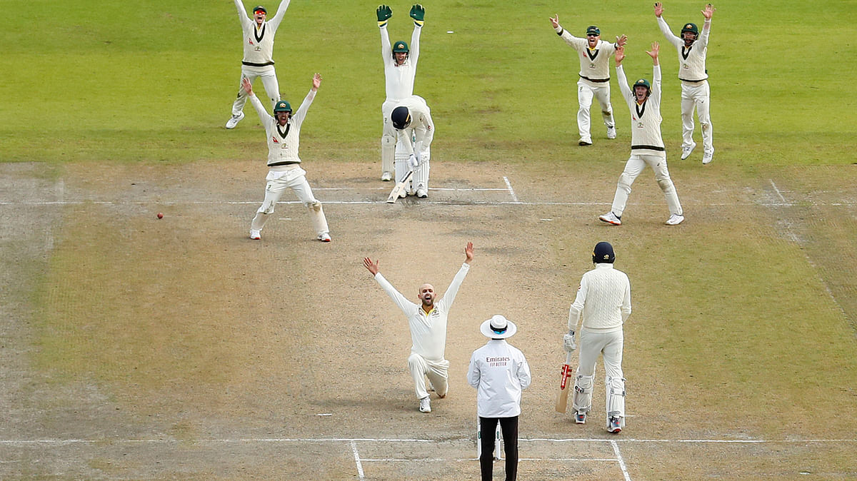 Australia`s Nathan Lyon appeals successfully for the wicket of England`s Jofra Archer. Photo: Reuters