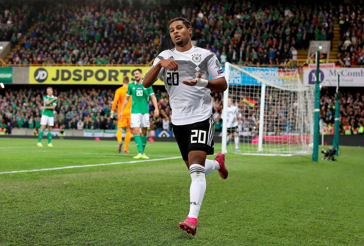 Germany`s midfielder Serge Gnabry celebrates scoring their second goal during the the Euro 2020 football qualification match between Northern Ireland and Germany at Windsor Park in Belfast on Monday. Photo: AFP