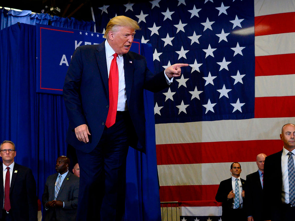 US President Donald Trump arrives for a `Keep America Great` campaign rally at The Crown Arena in Fayetteville, North Carolina, on 9 September. Photo: AFP