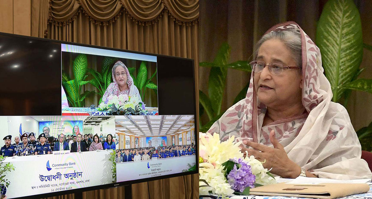 Prime minister Sheikh Hasina on Wednesday talks to the officials of Gulshan branch of Community Bank Bangladesh Limited and police officials present at Rajarbagh Police Lines auditorium through video conference while inaugurating the operations of Community Bank Bangladesh Limited approved under Bangladesh Police Kalyan Trust. Photo: PID