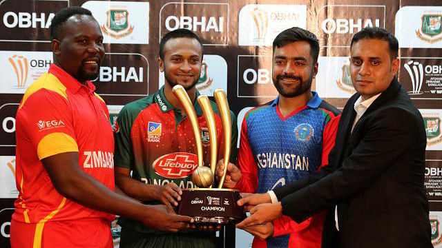 Bangladesh captain Shakib Al Hasan, Zimbabwe captain Hamilton Masakadza and Afghanistan captain Rashid Khan pose with the trophy of Tri-nation T20I series. Photo: Shamsul Haque