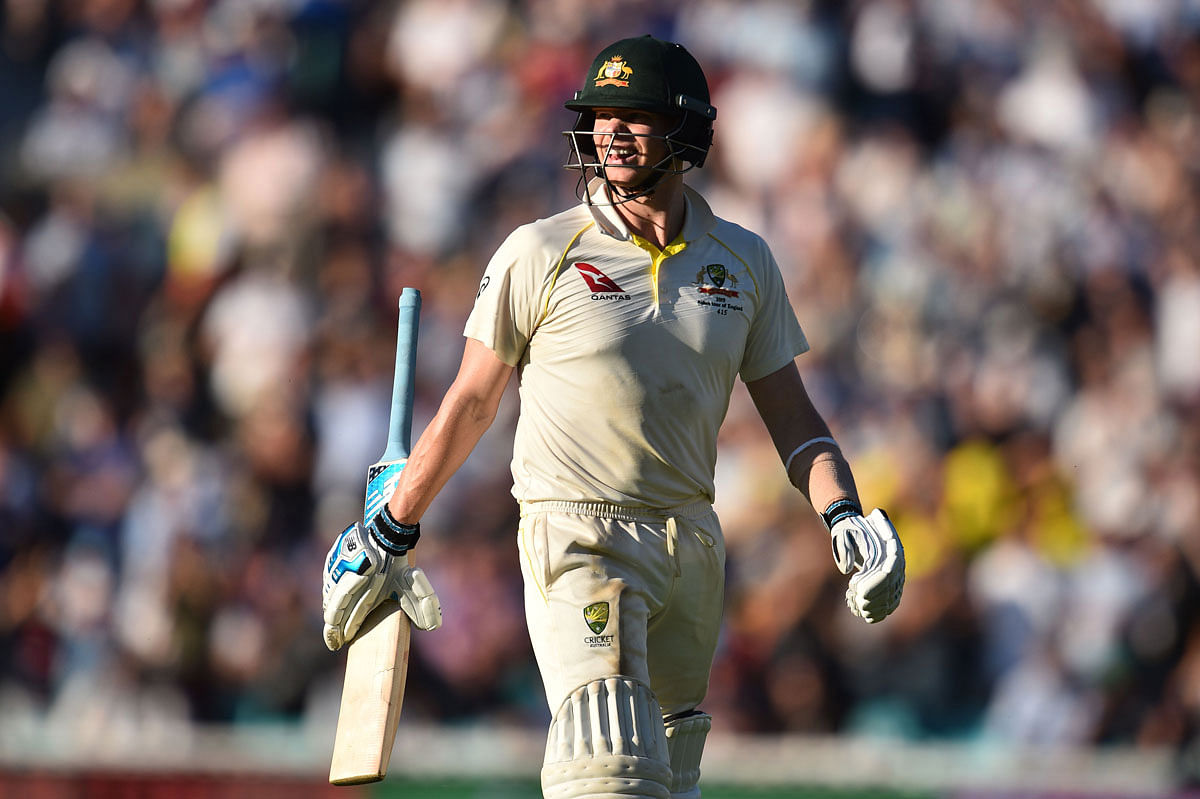 Australia`s Steve Smith walks off for 80 during play on the second day of the fifth Ashes cricket Test match between England and Australia at The Oval in London on Friday. Photo: AFP