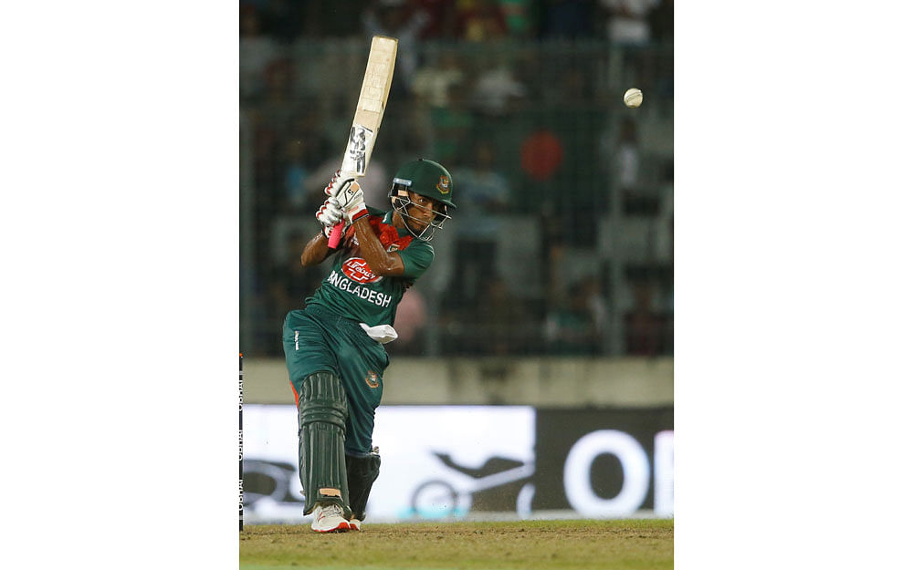 Afif Hossain from Bangladesh plays a shot during the first match between Bangladesh and Zimbabwe in the Tri-nations cup T20 series at The Sher-e Bangla National Stadium in Dhaka on 13 September 2019. Photo: AFP