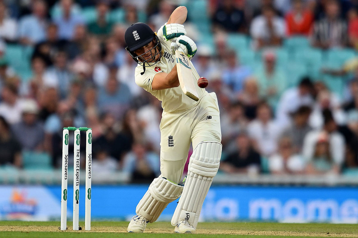 England`s Jos Buttler plays a shot during play on the third day of the fifth Ashes cricket Test match between England and Australia at The Oval in London on 14 September 2019. Photo: AFP