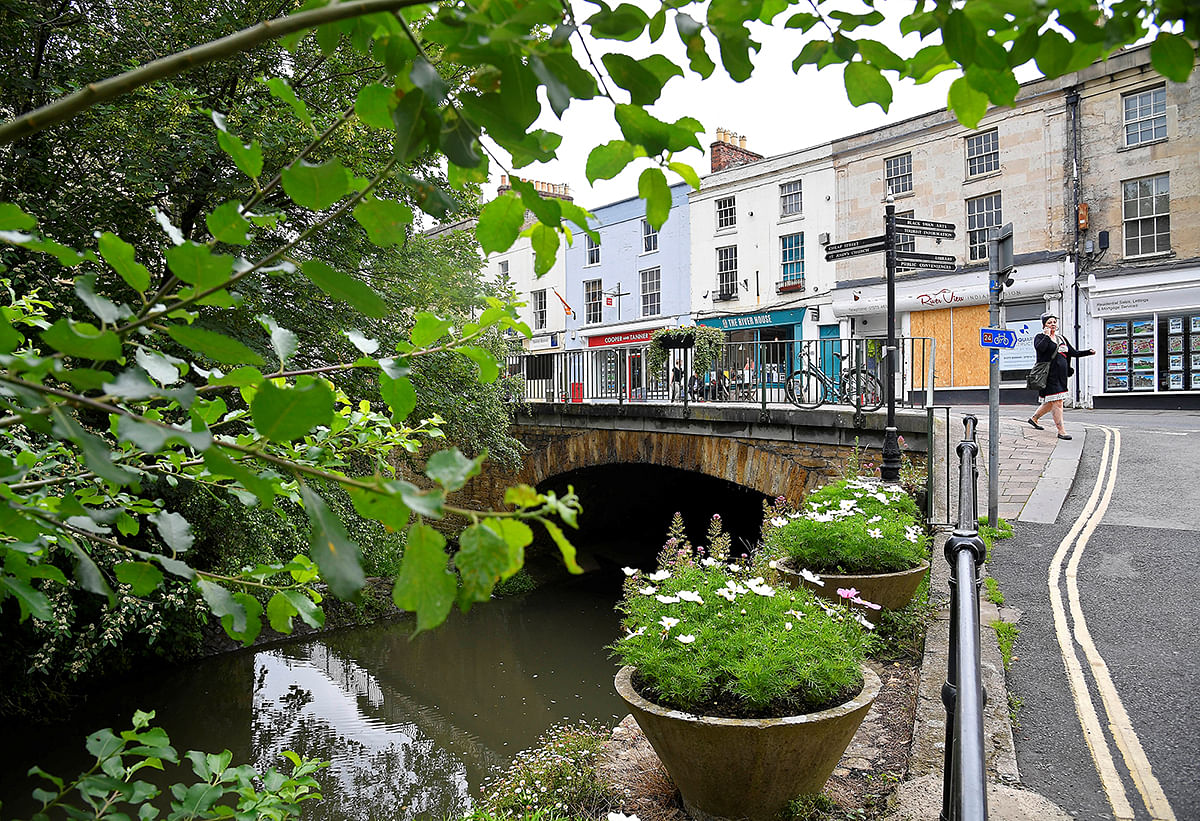 The river Frome is seen running through the centre of Frome. Picture taken 25 June 2019. Photo: Reuters