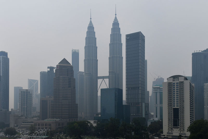 The Petronas Twin Towers (C) are seen in Kuala Lumpur on 11 September 2019. Photo: AFP