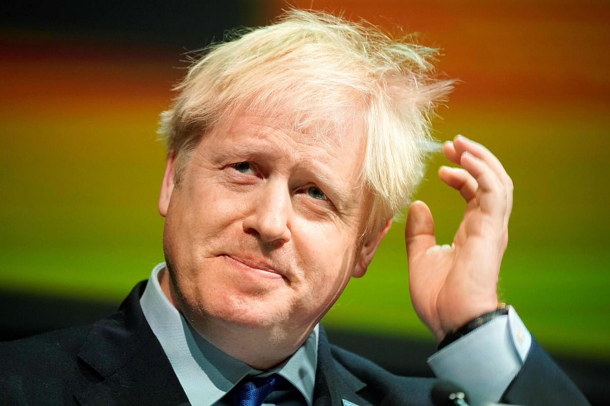 Britain`s prime minister Boris Johnson gestures as he delivers his speech at the Convention of the North, in the Magna Centre in Rotherham, norhtern England on 13 September. Photo: AFP