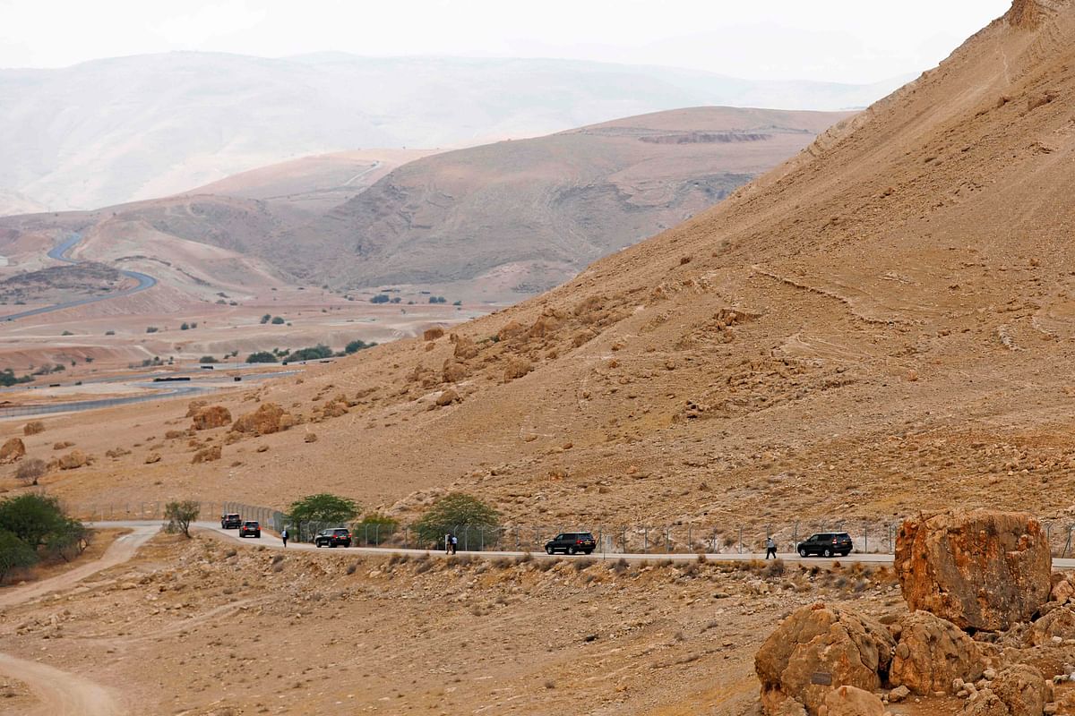 A convoy drives off after Israeli Prime Minister Benjamin Netanyahu held a weekly cabinet meeting in the Jordan Valley, in the Israeli-occupied West Bank on 15 September. Photo: AFP