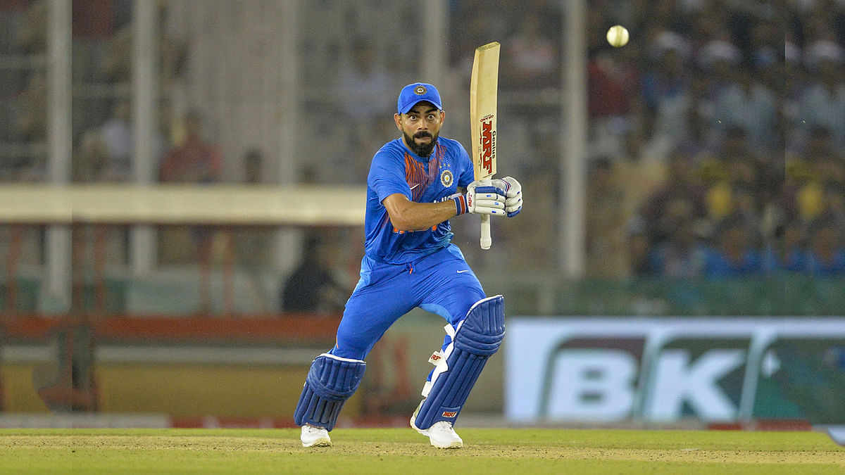 India`s team captain Virat Kohli plays a shot during the second Twenty20 international cricket match of a three-match series between India and South Africa at Punjab Cricket Association Stadium in Mohali on 18 September, 2019. Photo: AFP