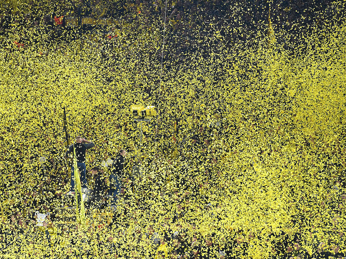 Dortmund fans throw confetti prior to the UEFA Champions League Group F football match Borussia Dortmund v FC Barcelona in Dortmund, western Germany, on 17 September 2019. Photo: AFP