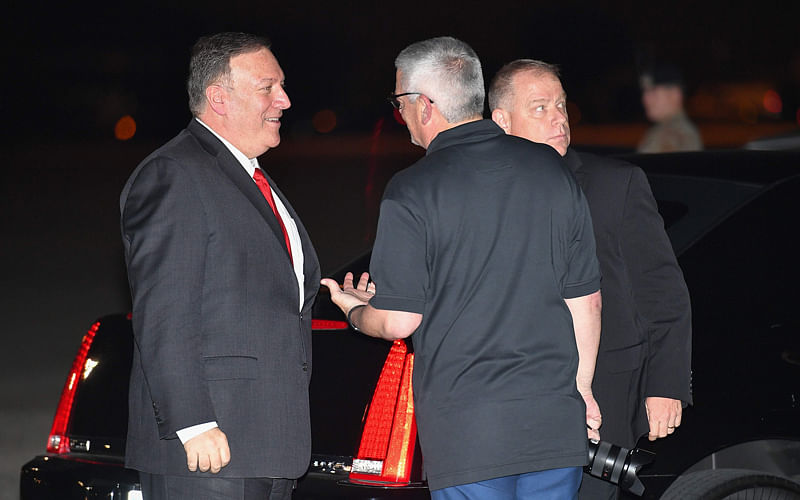 US Secretary of State Mike Pompeo gets ready to board his plane departing from Andrews Air Force Base in Maryland on Tuesday. Pompeo is heading to Saudi Arabia and the United Arab Emirates. Photo: AFP