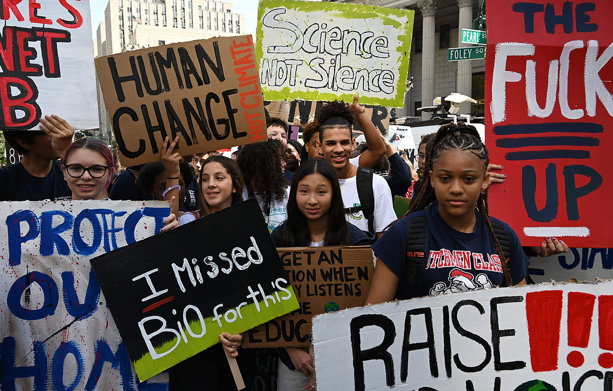 People gather during the Global Climate Strike march at Foley Square in New York 20 September, 2019. Photo: AFP